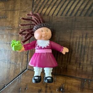 Cabbage Patch Kids  (CPK) GIirl Holding Present 1992 3" PVC Figure Yarn Hair